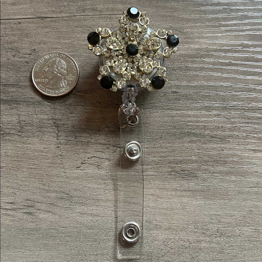 Rhinestone flower badge reel